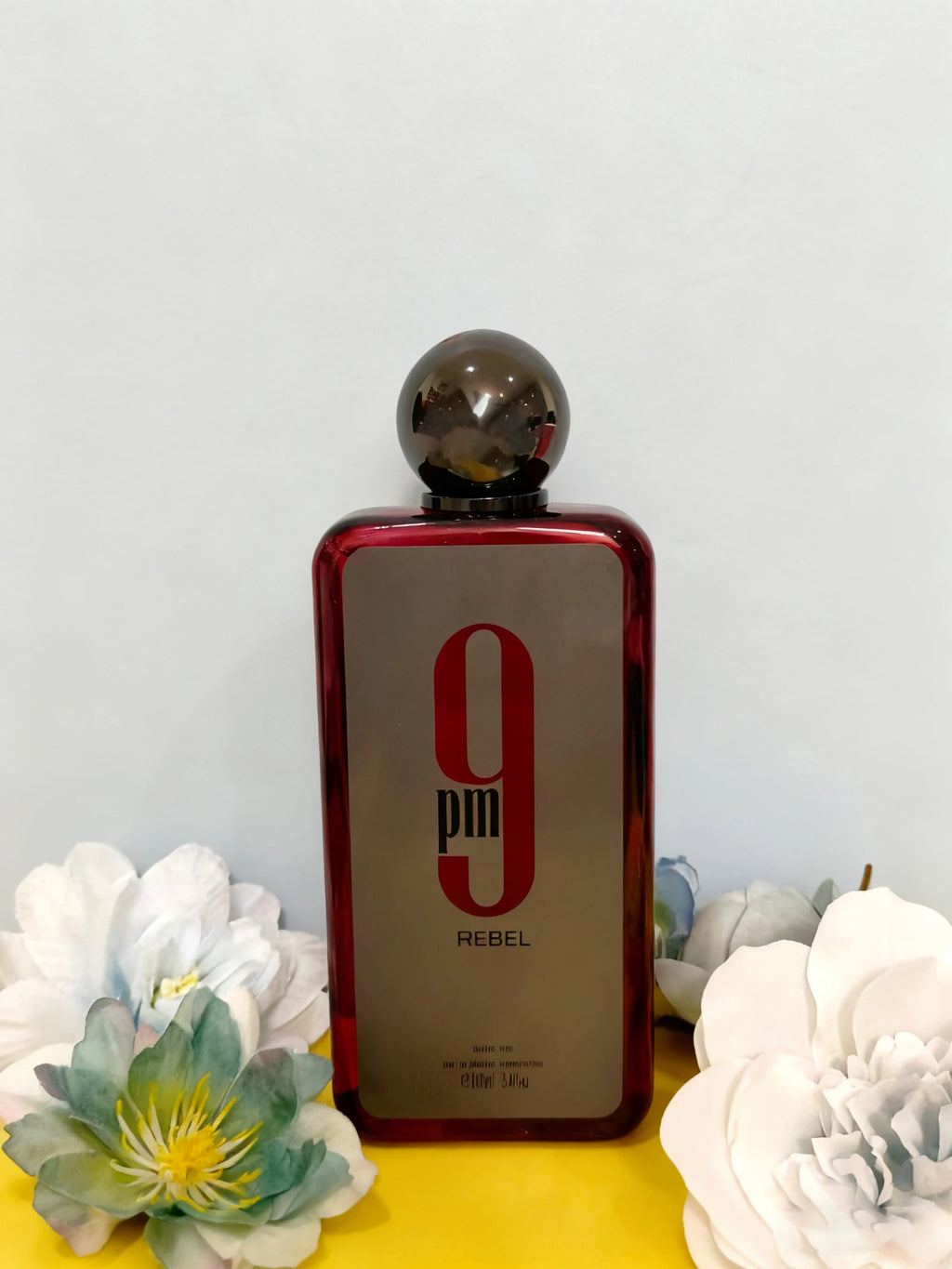 Perfume en spray 9pm Rebel Neutral EDP 3.4oz/100ml - notas frutales y amaderadas con piña y caramelo
