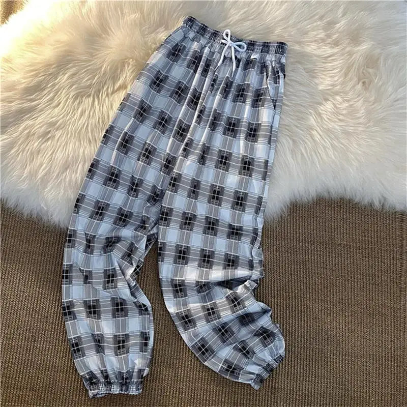 Pantalones Mujer nuevo montón de pies moda suelta negro a cuadros verano Harajuku estudiantes ropa de calle Harem pantalones largos mujer Chic