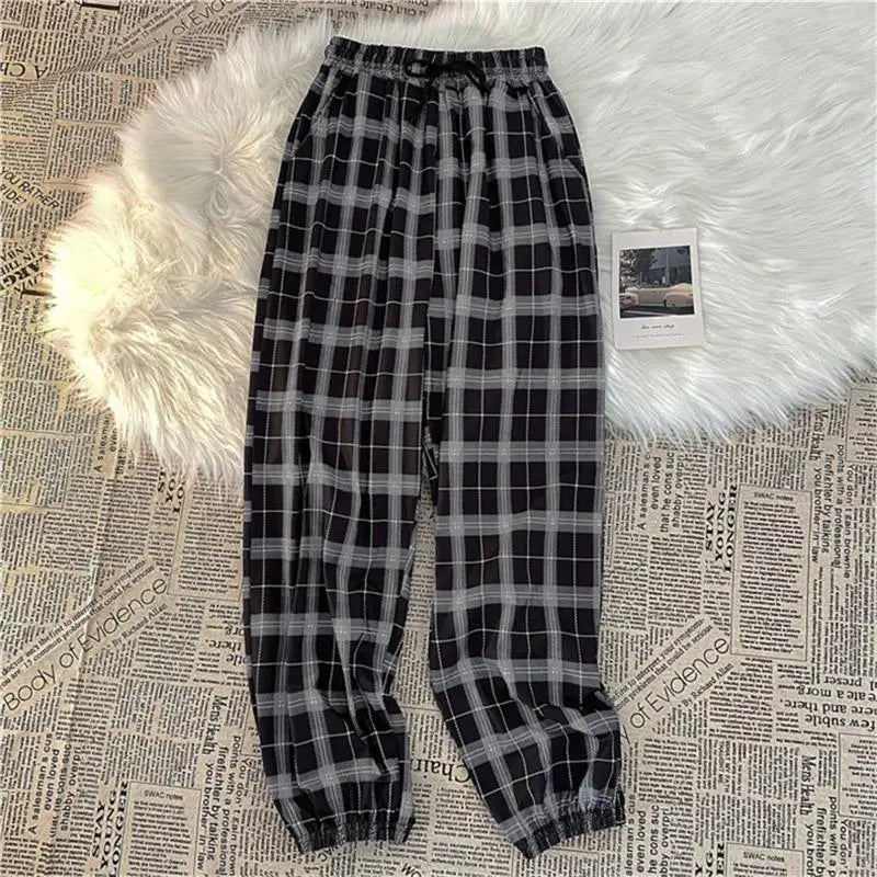 Pantalones Mujer nuevo montón de pies moda suelta negro a cuadros verano Harajuku estudiantes ropa de calle Harem pantalones largos mujer Chic