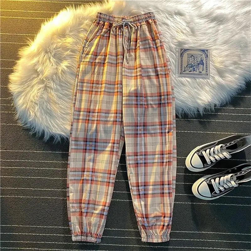 Pantalones Mujer nuevo montón de pies moda suelta negro a cuadros verano Harajuku estudiantes ropa de calle Harem pantalones largos mujer Chic