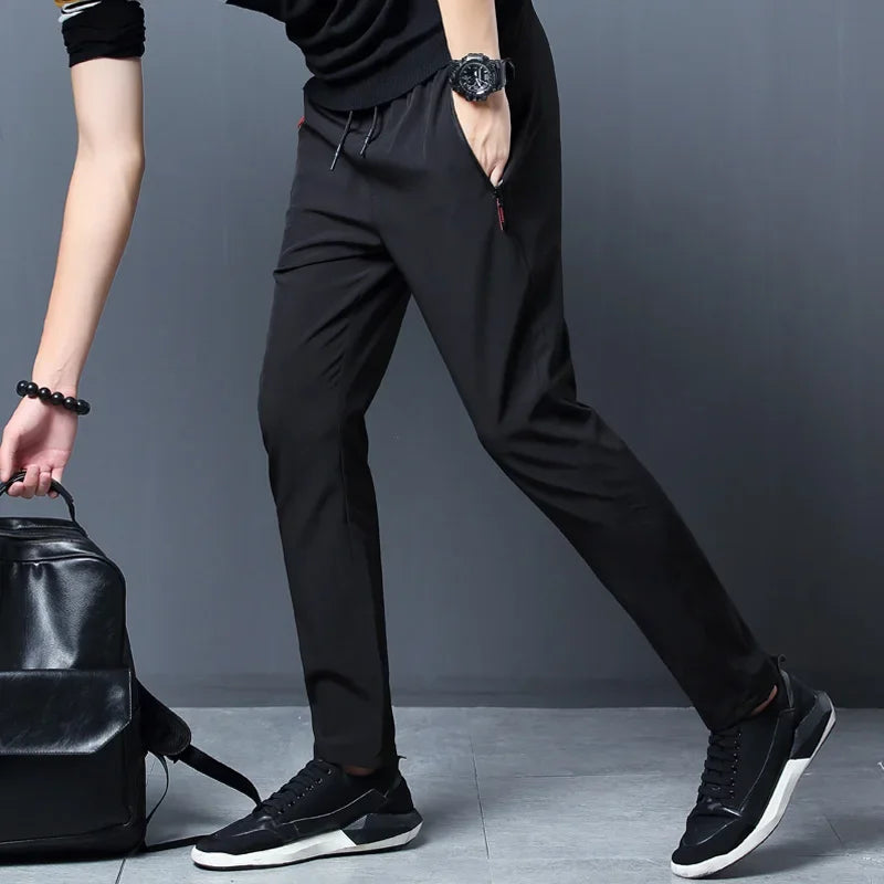 Pantalones informales para hombre, pantalones elásticos ajustados con cintura elástica, pantalones clásicos coreanos azules, negros y grises de marca para hombre de talla grande