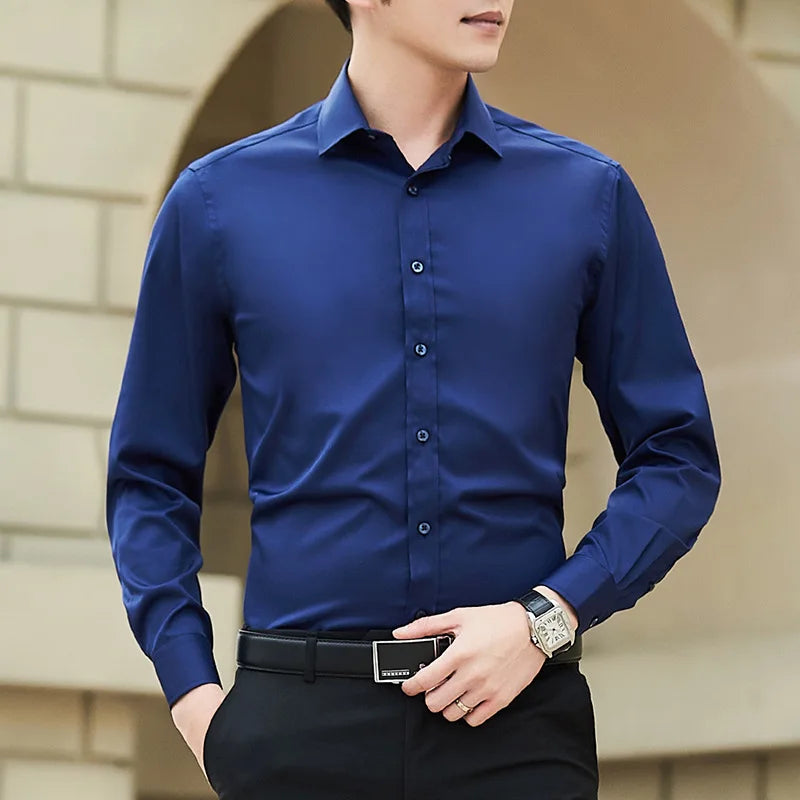 Nueva camisa de negocios de Color sólido de talla grande para hombre, camisa de manga larga blanca ajustada informal básica clásica a la moda, ropa de marca
