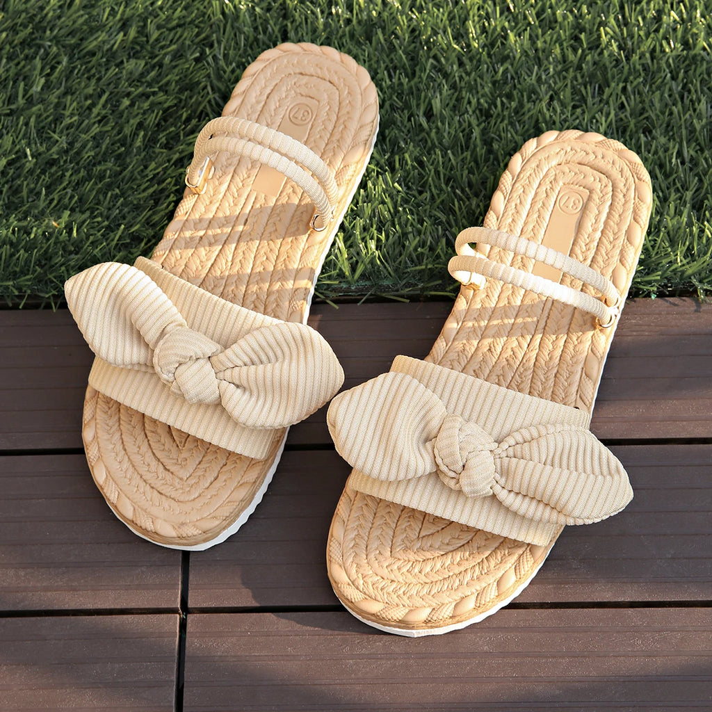 Sandalias planas con lazo de pana a la moda, zapatillas ligeras antideslizantes para exteriores para mujer, sandalias de playa informales de suela blanda para verano 2025
