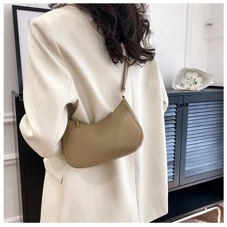 Bolso de mano de color sólido moderno y moderno, bolso cuadrado pequeño simple y nuevo, bolso para axila de un solo hombro elegante y de alta calidad