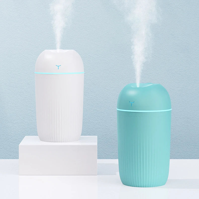 El nuevo humidificador de aire con una pequeña cantidad de difusor de máquina de humidificación humidificador de dormitorio con pulverizador de niebla ultrapeso