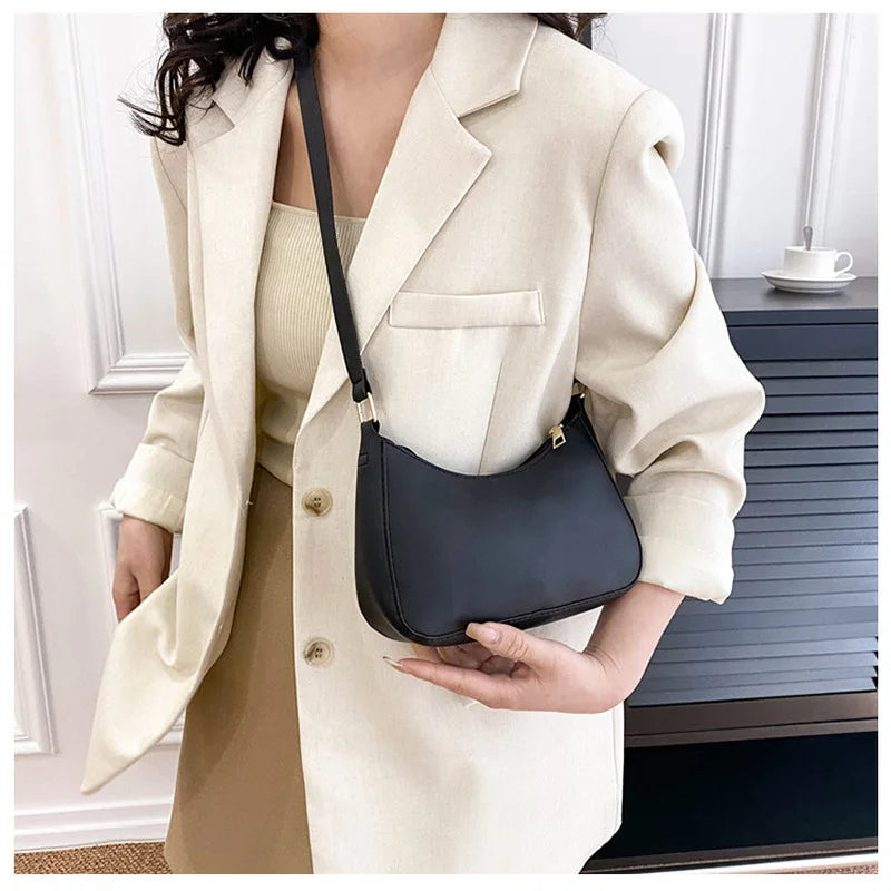 Bolso de mano de color sólido moderno y moderno, bolso cuadrado pequeño simple y nuevo, bolso para axila de un solo hombro elegante y de alta calidad