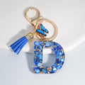 Exquisito llavero de resina de piedra esmaltada azul de A a Z, 26 iniciales, colgante de borla de mariposa, llavero para mujeres y hombres, llavero de coche, regalo