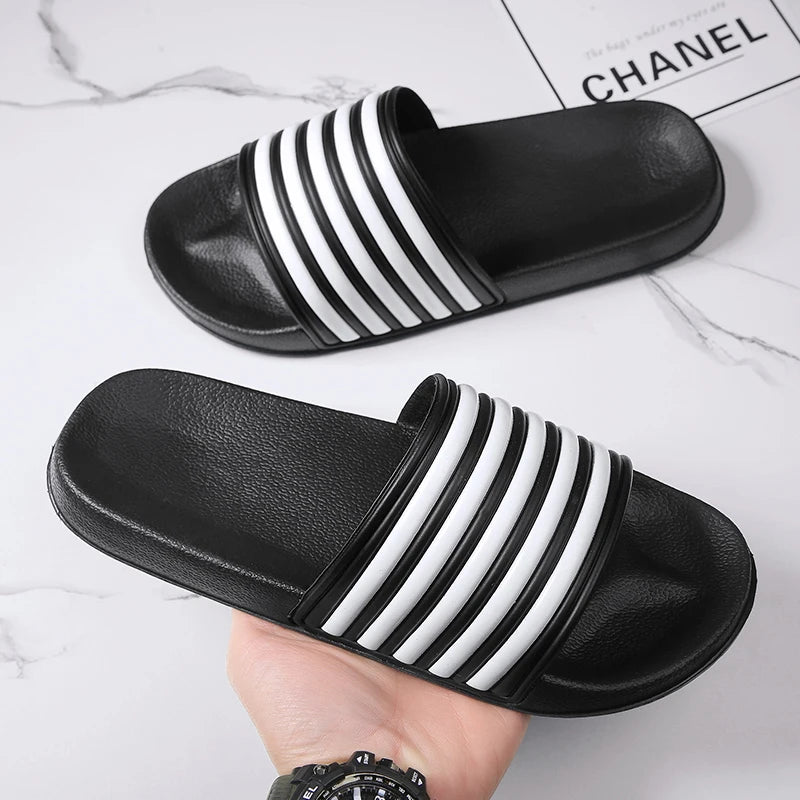 2025 NUEVAS SANDALIAS para hombres y mujeres Slip-On Internet Celebridad Suela suave Prendas de abrigo Pareja Playa Casa Sandalias y zapatillas