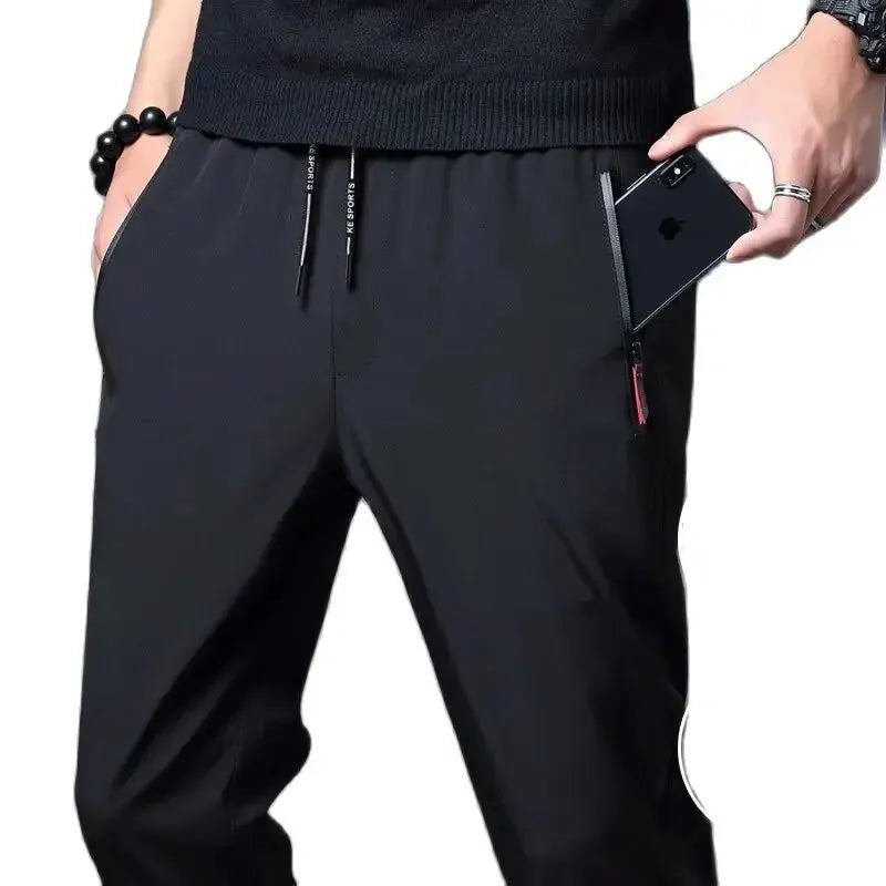 Pantalones informales para hombre, pantalones elásticos ajustados con cintura elástica, pantalones clásicos coreanos azules, negros y grises de marca para hombre de talla grande