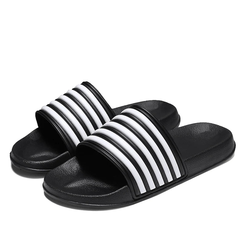 2025 NUEVAS SANDALIAS para hombres y mujeres Slip-On Internet Celebridad Suela suave Prendas de abrigo Pareja Playa Casa Sandalias y zapatillas