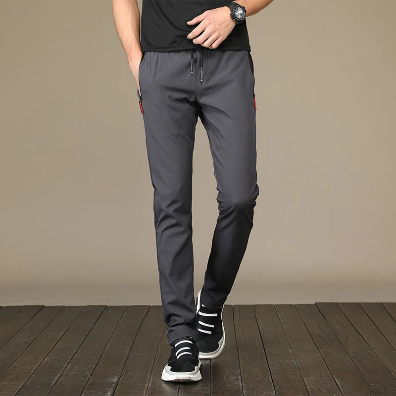 2025 Pantalones para correr para hombre Pantalones casuales finos de secado rápido Pantalones deportivos con bolsillos con cremallera Ropa deportiva Correr Pantalones deportivos para correr