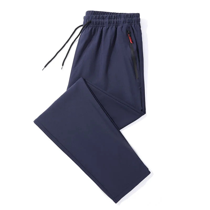 Pantalones informales para hombre, pantalones elásticos ajustados con cintura elástica, pantalones clásicos coreanos azules, negros y grises de marca para hombre de talla grande