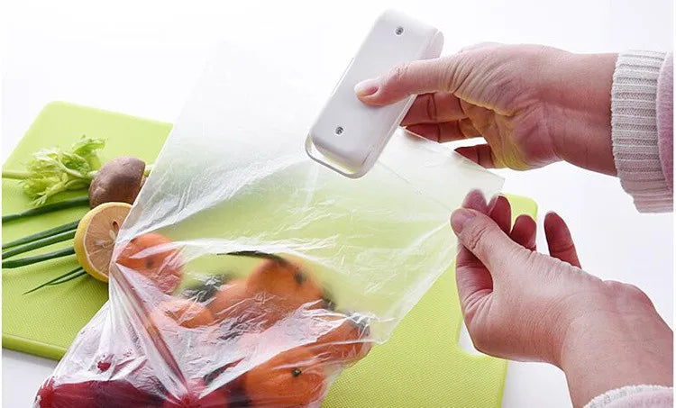 Mini máquina de sellado de bolsas Hea, sellador de paquetes, bolsas de plástico térmico para alimentos