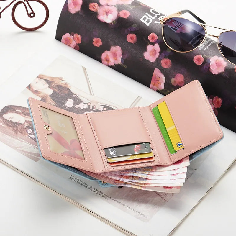 2024 nuevo monedero femenino corto versión coreana de estudiantes fresco plegable Mini billetera de Metal lindo bolso de animales