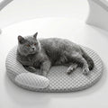 Cama refrescante para perros, colchoneta de seda helada para gatos, nido ovalado para mascotas, almohadilla transpirable de disipación de calor para perros pequeños, medianos y grandes, y gatos.