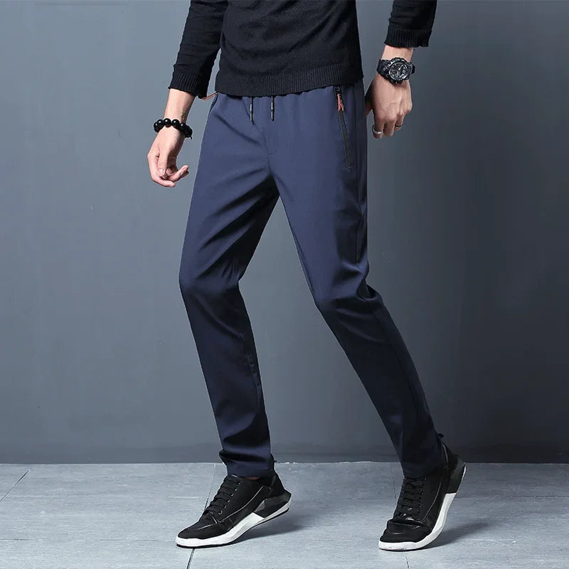 Pantalones informales para hombre, pantalones elásticos ajustados con cintura elástica, pantalones clásicos coreanos azules, negros y grises de marca para hombre de talla grande