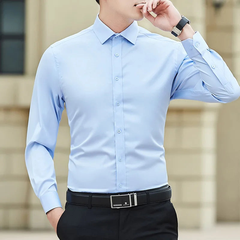 Nueva camisa de negocios de Color sólido de talla grande para hombre, camisa de manga larga blanca ajustada informal básica clásica a la moda, ropa de marca