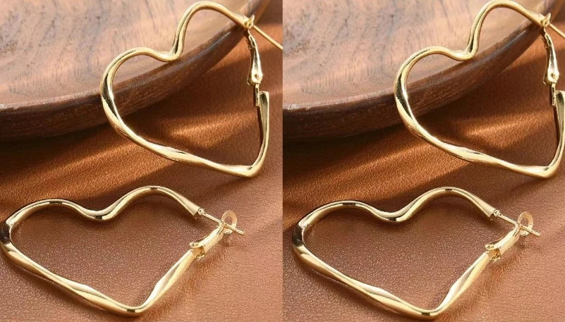 1 par de moda para mujer, moda, personalidad exagerada, diseño de corazón hueco, puño para niña, regalo de joyería de cumpleaños