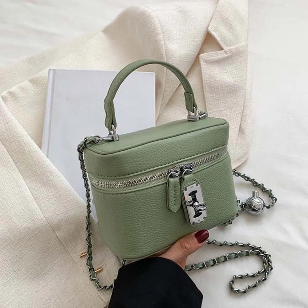 Bolso de mano cuadrado compacto con textura granulada, cierre de cremallera, estilo macaron, de cuero vegano, construcción sólida.