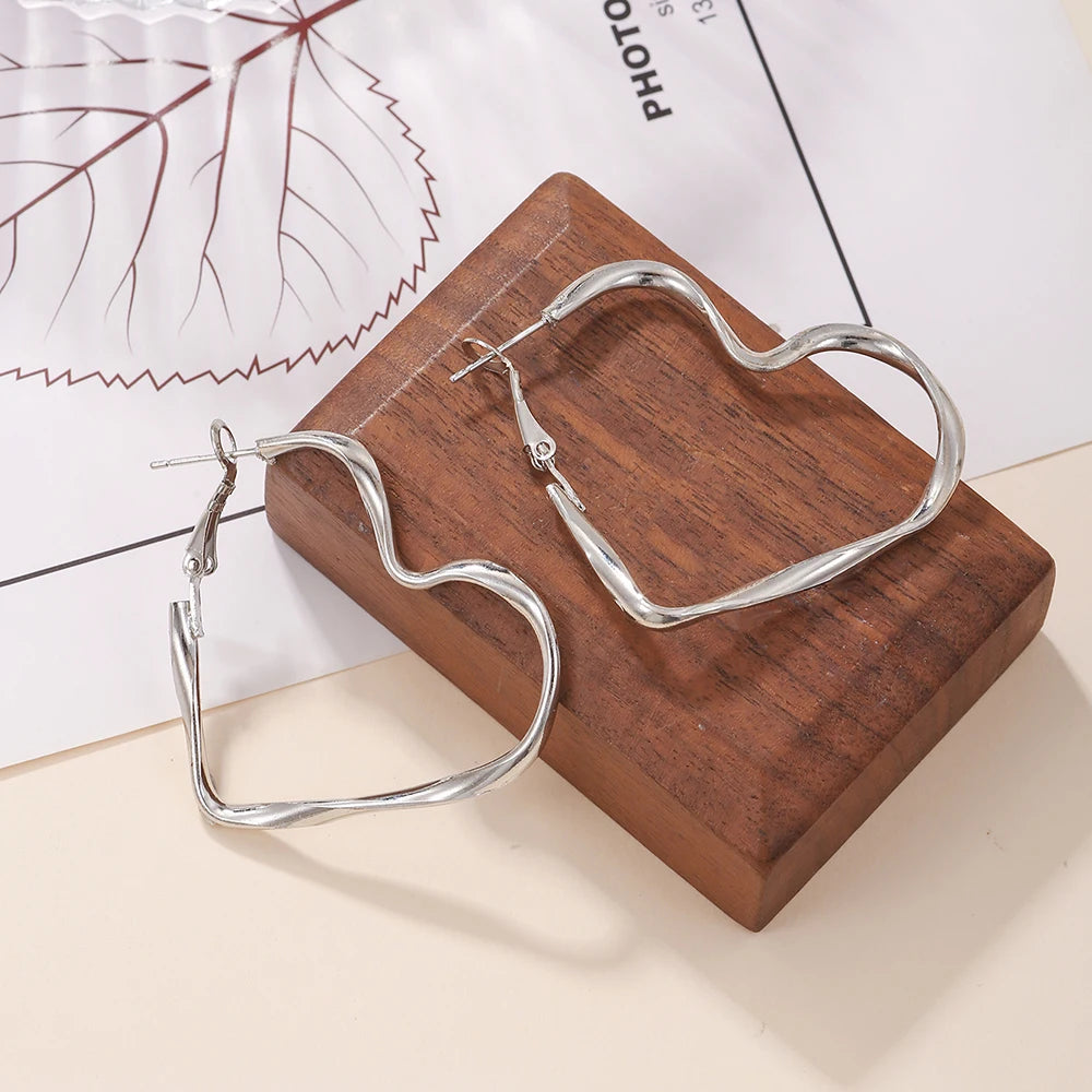 1 par de moda para mujer, moda, personalidad exagerada, diseño de corazón hueco, puño para niña, regalo de joyería de cumpleaños