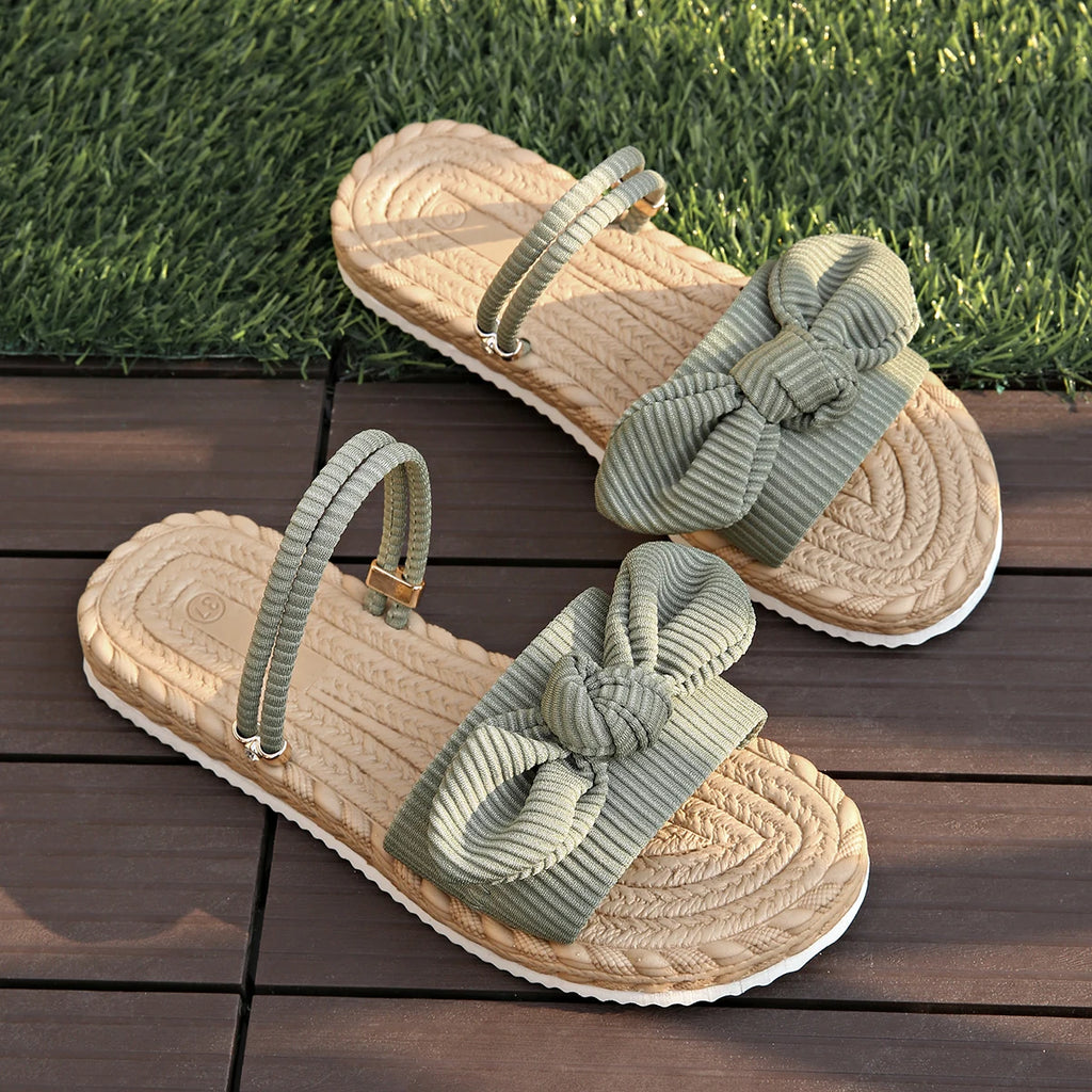 Sandalias planas con lazo de pana a la moda, zapatillas ligeras antideslizantes para exteriores para mujer, sandalias de playa informales de suela blanda para verano 2025