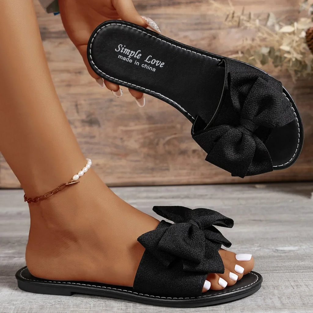 Zapatillas De Mujer 2025, nuevas sandalias De moda, sandalias deslizantes con lazo De verano para Mujer, Zapatos para mantener el calor, zapatillas planas De talla grande para Mujer