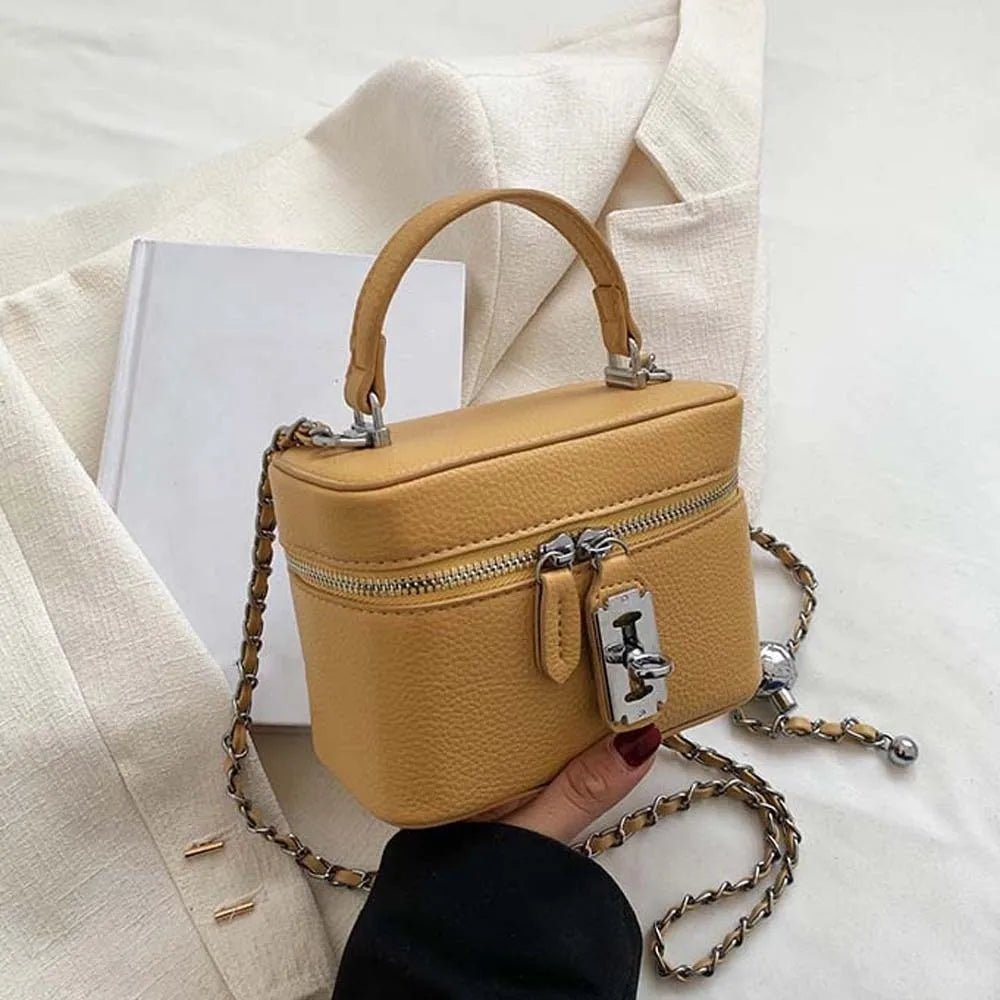 Bolso de mano cuadrado compacto con textura granulada, cierre de cremallera, estilo macaron, de cuero vegano, construcción sólida.