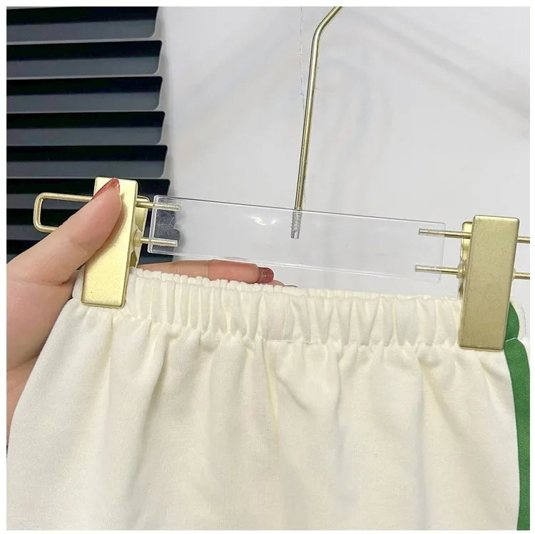 Traje de manga corta para niños, conjunto a rayas para niñas y niños, Tops de verano + ropa corta para bebés, novedad de 2024