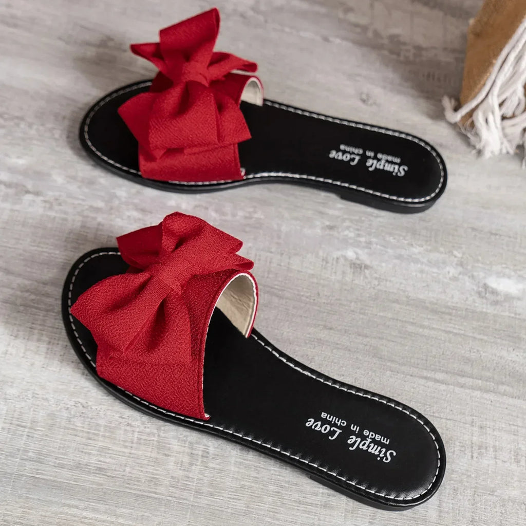 Zapatillas De Mujer 2025, nuevas sandalias De moda, sandalias deslizantes con lazo De verano para Mujer, Zapatos para mantener el calor, zapatillas planas De talla grande para Mujer