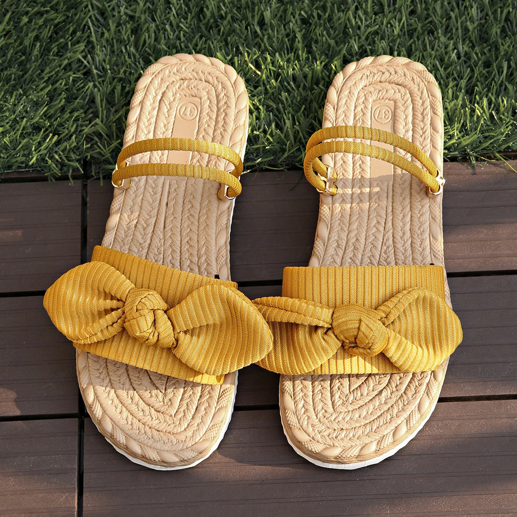 Sandalias planas con lazo de pana a la moda, zapatillas ligeras antideslizantes para exteriores para mujer, sandalias de playa informales de suela blanda para verano 2025