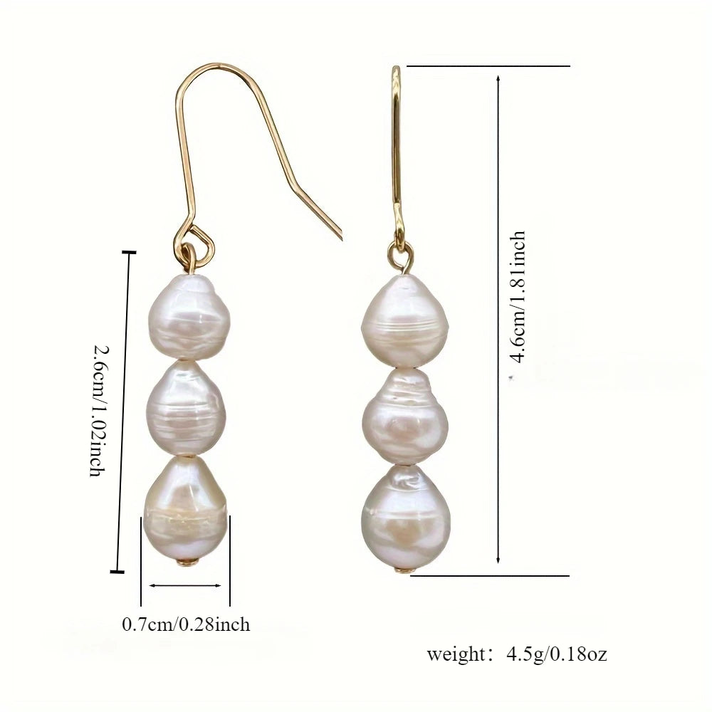 Nuevos pendientes barrocos de perlas de agua dulce de moda. Pendientes largos de tres cuentas simples, elegantes y versátiles.
