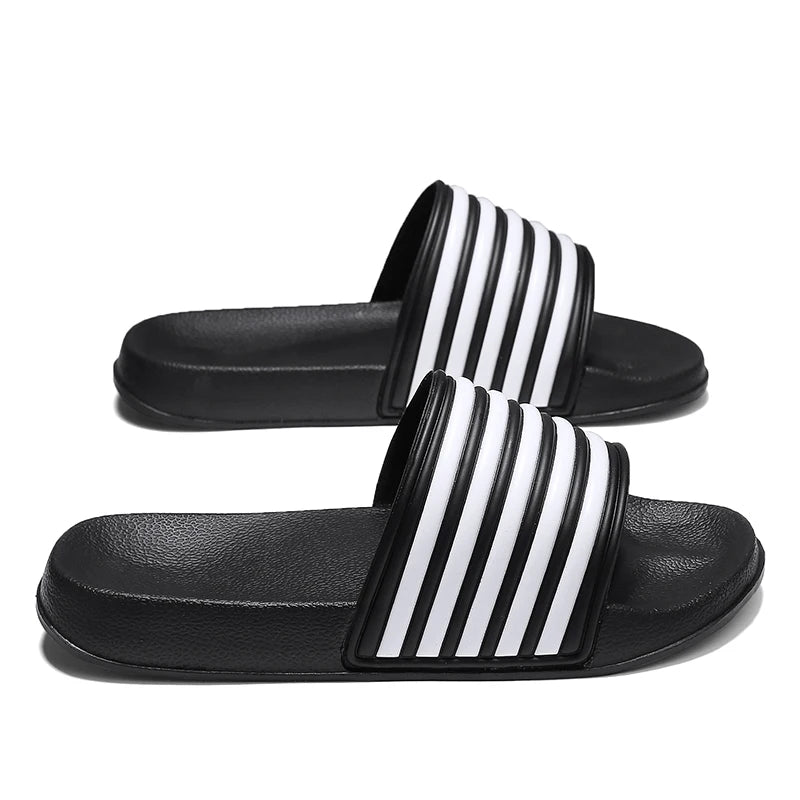 2025 NUEVAS SANDALIAS para hombres y mujeres Slip-On Internet Celebridad Suela suave Prendas de abrigo Pareja Playa Casa Sandalias y zapatillas