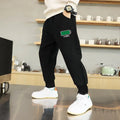 Pantalones de algodón para primavera y otoño para niños, pantalones deportivos de ocio para bebés, pantalones con estampado de planeta espacial para niños, pantalones de chándal para estudiantes de 3 a 14 años