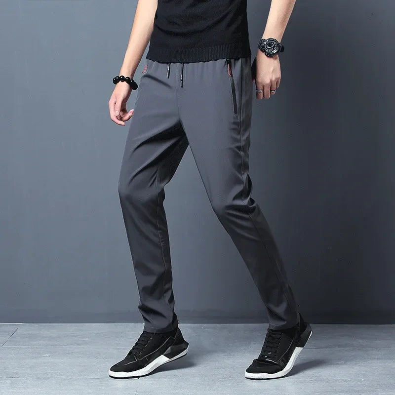 2025 Pantalones para correr para hombre Pantalones casuales finos de secado rápido Pantalones deportivos con bolsillos con cremallera Ropa deportiva Correr Pantalones deportivos para correr
